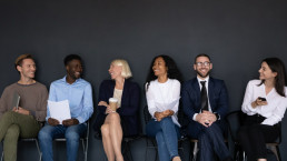 A Diverse Recruiting Strategy is needed for hiring a diverse workforcehave fun talking, happy multiethnic diverse applicants speak and chat joke laugh before hiring process, employment concept